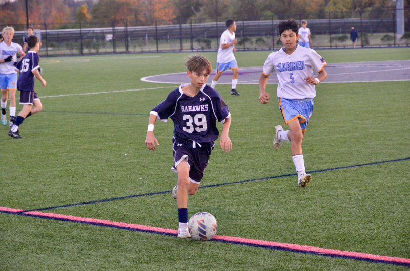Sussex Academy eighth-grader Austin Brobyn carries the ball.