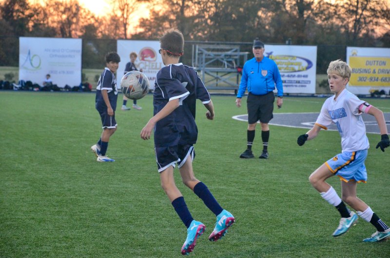 Sussex Academy seventh-grader Eli Evans traps the ball.
