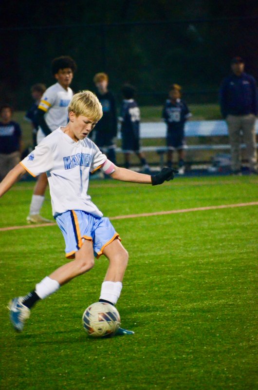 Mariner eighth-grader Liam Tyndall scores the game-winner from about 25 yards out.