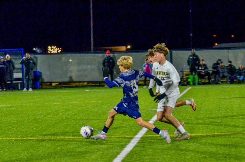 Seahawks eighth-grader Nico Haskell flies past a couple of high schoolers.