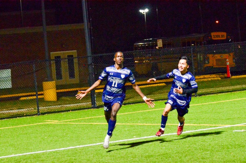 Seahawks senior Jesse Jean-Louis celebrates his goal with his old friend Jose Figueroa-Morales after the former JV teammates linked up on a familiar play to score the biggest goal of each of their respective careers.