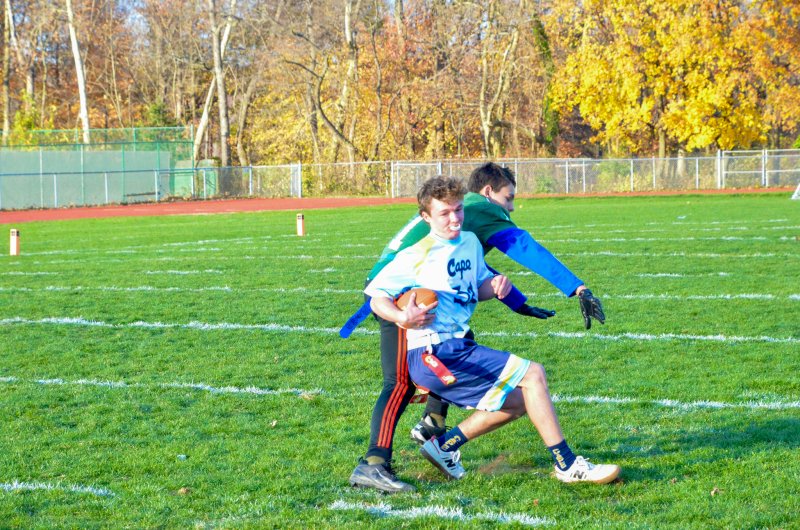 Cape sophomore Patrick Healy roll dodges.