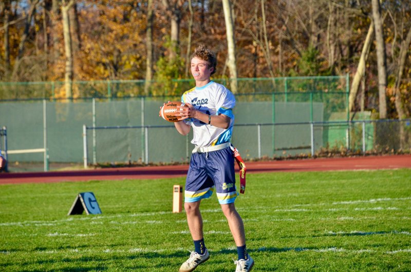 Vikings sophomore Patrick Healy operates with his back to the end zone.