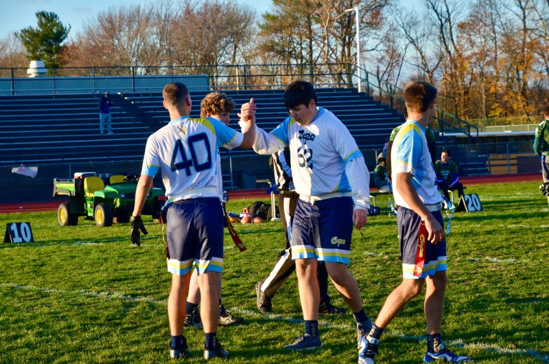 Jaxon Benton, left, and Michael Anthony celebrate the Cape unified flag football team’s 52-38 upset win over Mount Pleasant in the quarterfinals of the state tournament Nov. 13. AARON R. MUSHRUSH PHOTOS