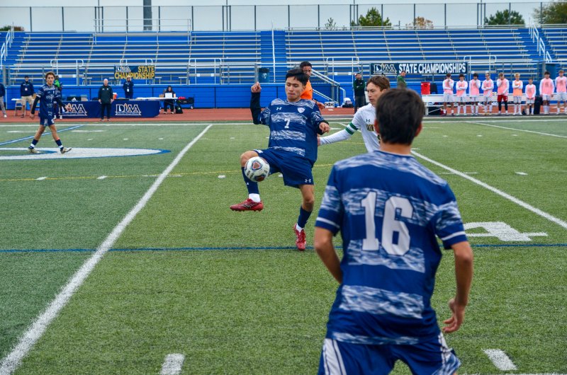 Sussex Academy sophomore Bodhi Williams has the best view in the house of junior Jose Figueroa-Morales winning this ball.