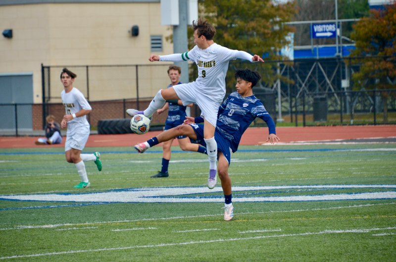 You never know what the pitch will bring. Making the Karate-kid-like moves are Sussex Academy senior Ruendi Ortiz-Santos and Saint Mark’s senior Gabriel Arick.