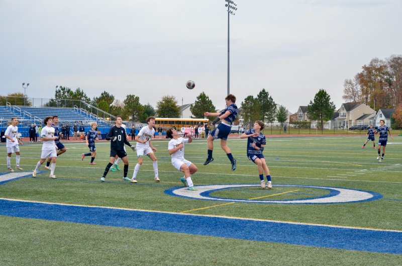 Sussex Academy junior Carson Klahr flies up on a corner and nearly generated a goal.
