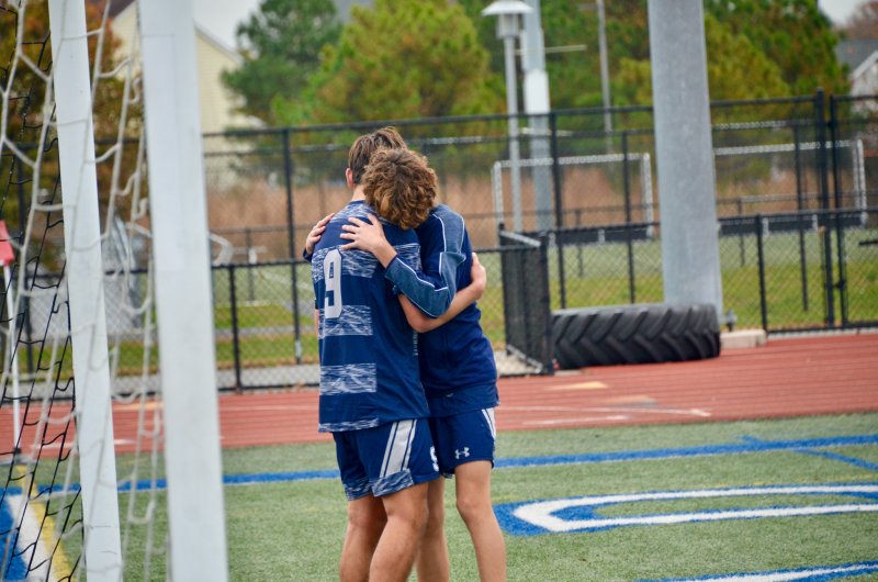 Seahawks senior George Sapna embraces freshman Alex Horner, highlighting how much these guys care for each other.