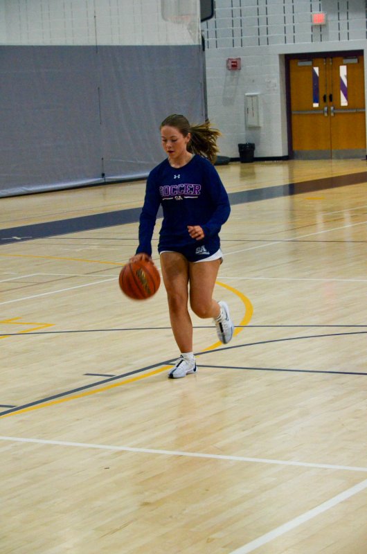Lilly Carlisle drives the lane.