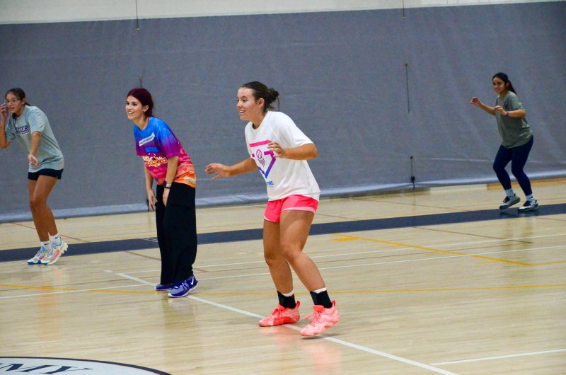 Savannah Hope, left, and Patti Lara Nieto, right, do a drill while Bella Zorn and Grayce Glover laugh.