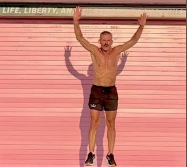 Personal trainer Bruce Clayton works on his 200 burpees for the day during The Body Shop Fitness Center’s annual fundraiser.