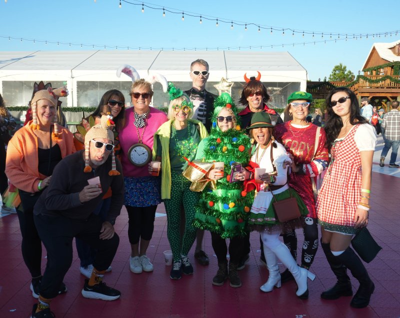 Costumed friends enjoy drinks after participating in the Dilly Dally Cruiser Rally Oct. 18. Shown are (l-r) Diann Rassman, Larry Wilde, Carla Cleary, Liz Zehner, Susannah Baden, Todd Conway, Amy Linzey, Patrick Beebe, Rose Furio, Ava Cannon and Coryn Cannon.