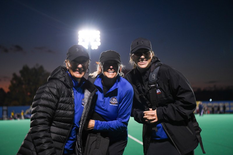 Southern chapter field hockey officials (l-r) Nancy Neeman, Vicki Rhodes and Taryn O’Brien (Nancy’s daughter) after the Smyrna-Caesar Rodney semifinal game at the University of Delaware.
