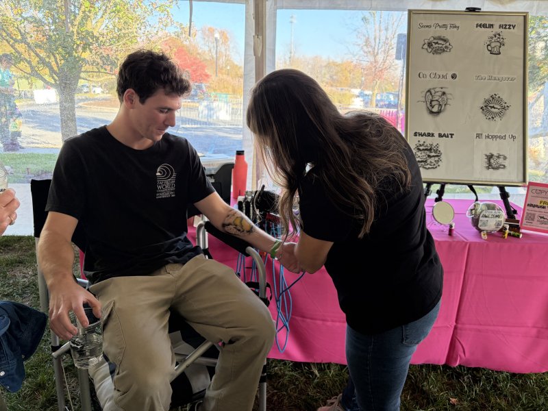 Finn Forcucci of Rehoboth Beach gets an airbrushed tattoo courtesy of CopyCat Paint Parties.