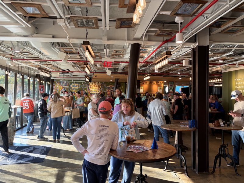 Customers line up inside Dogfish Head brewery’s main bar during Analog A-Birthday Nov. 8.