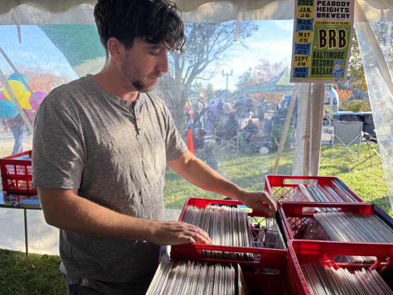The Dogfish Analog A-Birthday event’s biggest appeal was crate-digging through the vintage record collections for the perfect find, as demonstrated by Hunter Willis. RYAN MAVITY PHOTOS