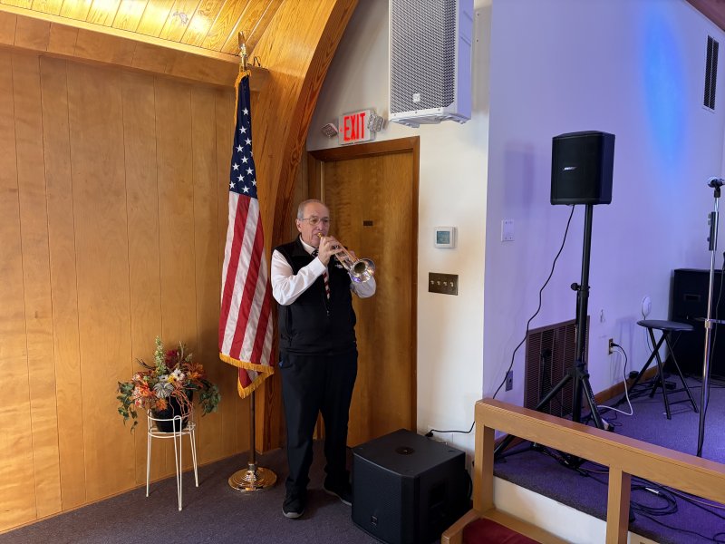 John Hoffman plays taps to conclude the Milton Lions Club event. RYAN MAVITY PHOTOS
