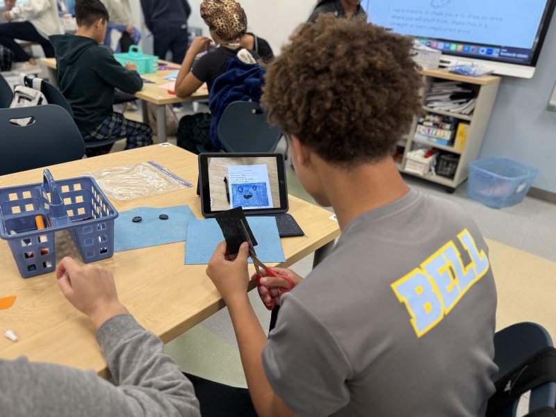 Cameron Bell, a Fred Thomas student, is focused on getting his monster design as accurate as possible.