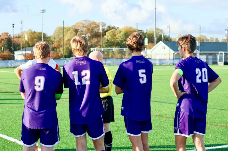 Shown in the captains’ meeting are (l-r) Josh Strawhecker, Harrison Schlabach, James Baxter and David Sagers.