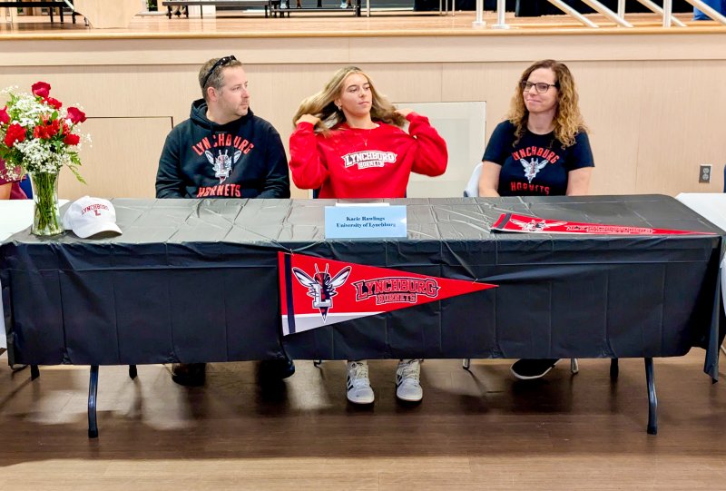 Sussex Academy senior Kacie Rawlings signs her letter of intent to play field hockey at Lynchburg. She had Dayne Eisele and Kara Rawlings with her for the ceremony.