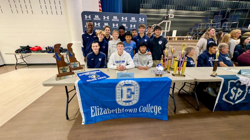 Chase Ballinger with his teammates. Shown in back (l-r) are J.J. Jean-Louis, Nico Haskell, Liam Stegall, Daniel Mareev, Mark Williams, Alec Perez-Sanchez, Ben Figueroa-Morales, George Sapna, Ben Steimel, and Brandon Jaimes. In front are Austin Taylor, Chase, and Ruendi Ortiz-Santos.