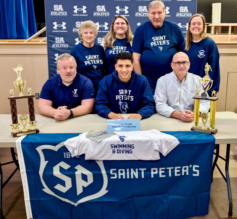 Christian Wright’s support system, in back, are (l-r) Mina Wright, Kimberly Wright, John Wright and Stephanie Hartsoe. In front is (l-r) Mike Vansant, Christian Wright and Tom Martiner.