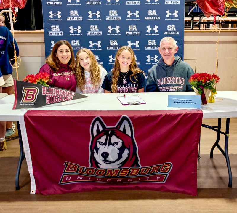 Sussex Academy senior Victoria Evans with her mom Liz, sister Eliza and dad Mark by her side.