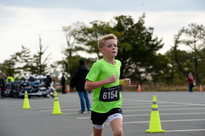 Deacon Odenwelder, 10, wins the Tunnel to Towers race.