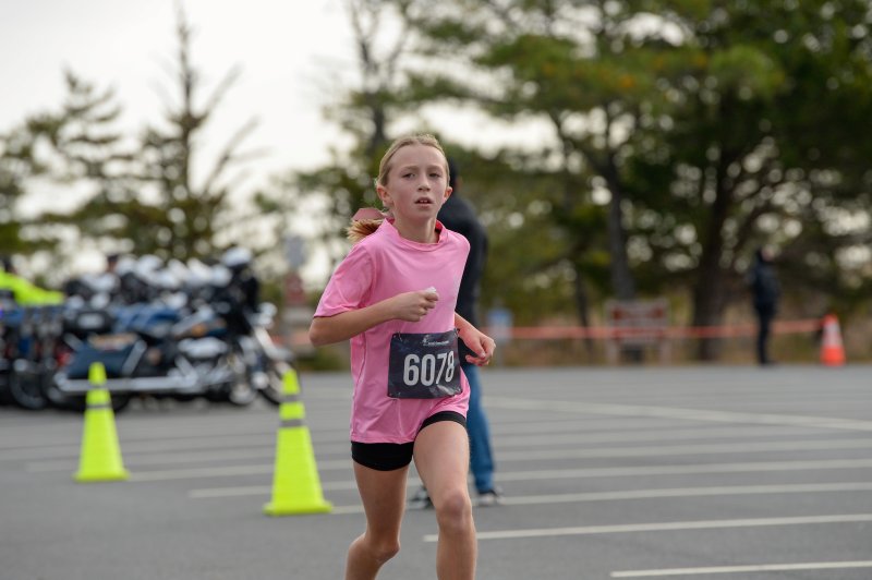 Chloe Cawthern, 9, is the first overall female in the Tunnel to Towers race.