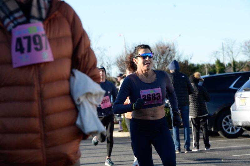 Teri Welsh claims the female masters title with a time of 24:17.