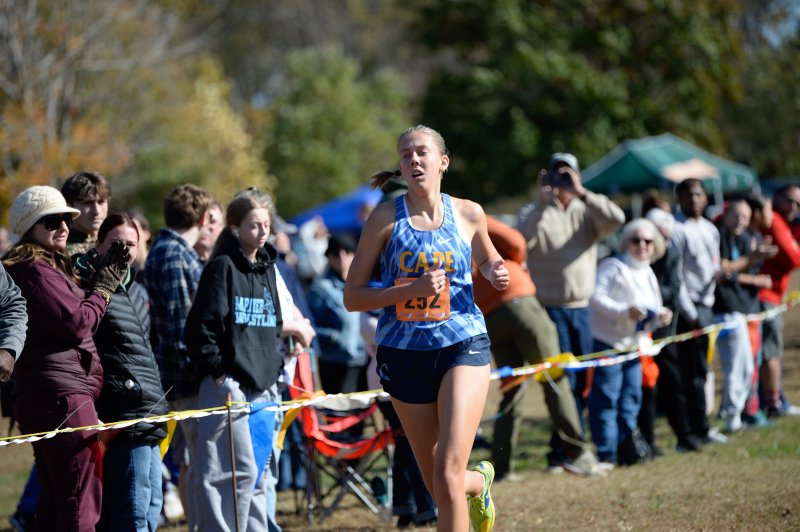 Emma Thompson of Cape crosses the line in 23:10.