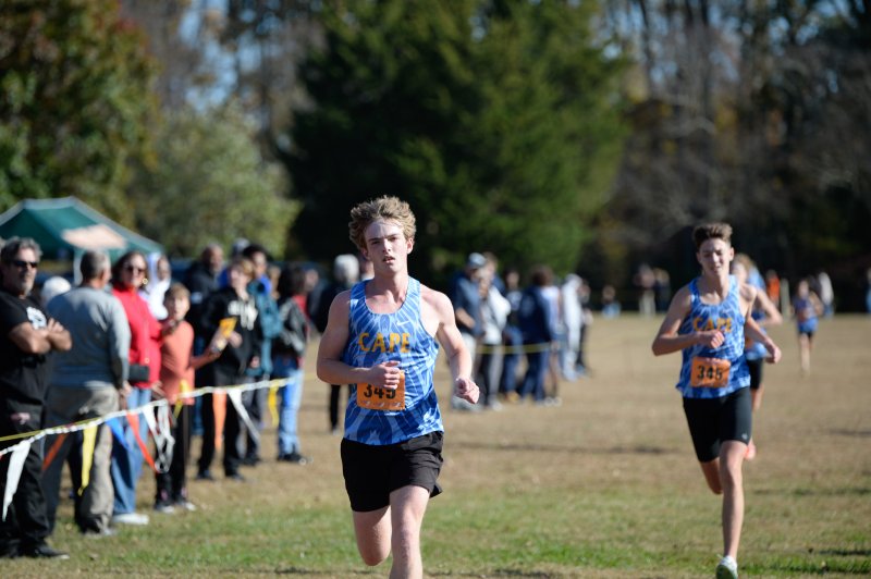 Jude Peacock (17:51) and Reece Kuklish (17:52), both of Cape, race to the finish line.
