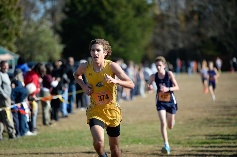Henry Hoge of Indian River crosses the line in 19:54.