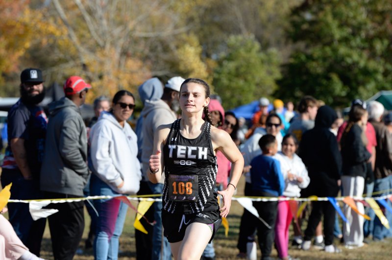 Savannah Stevenson of Sussex Tech cruises to a time of 20:21.