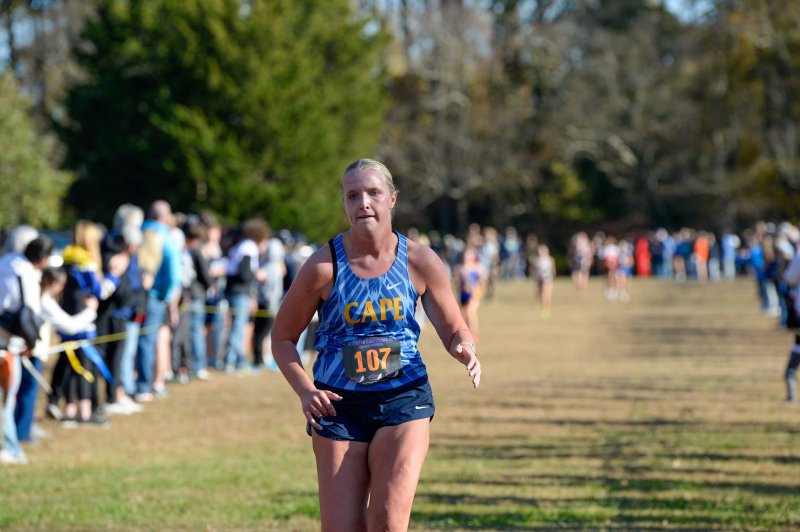 Natalie Schneider eyes the finish line. She crossed in 20:43.