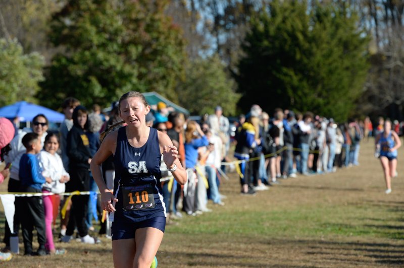 Riley Moriarty pushes through the finish to log a time of 21:03.