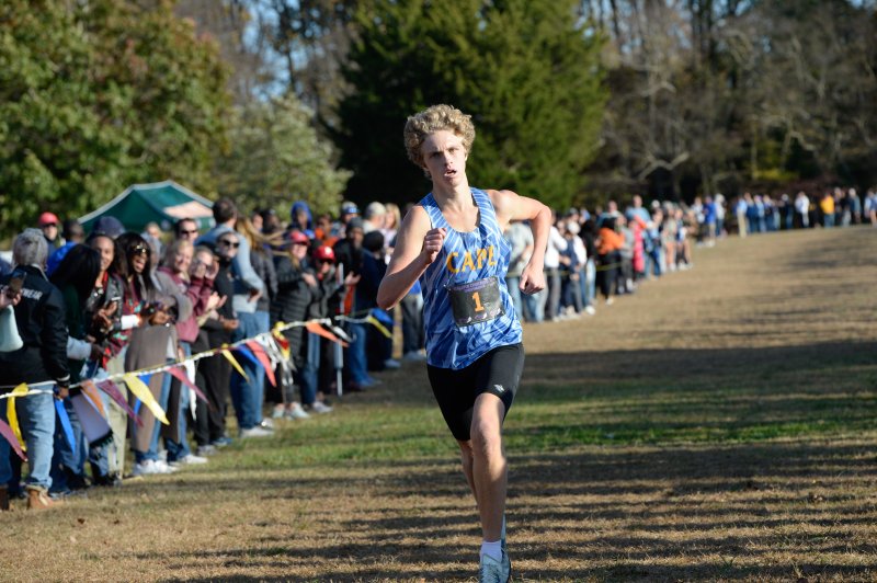 Jason Baker of Cape takes second place in 16:05.