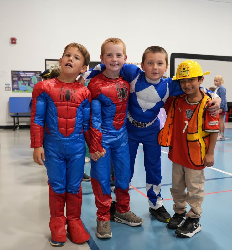 Standing together after the assembly are (l-r) Bryson Carmean, Rowen Duncan, Lucas Stevens and Falah Kayani.