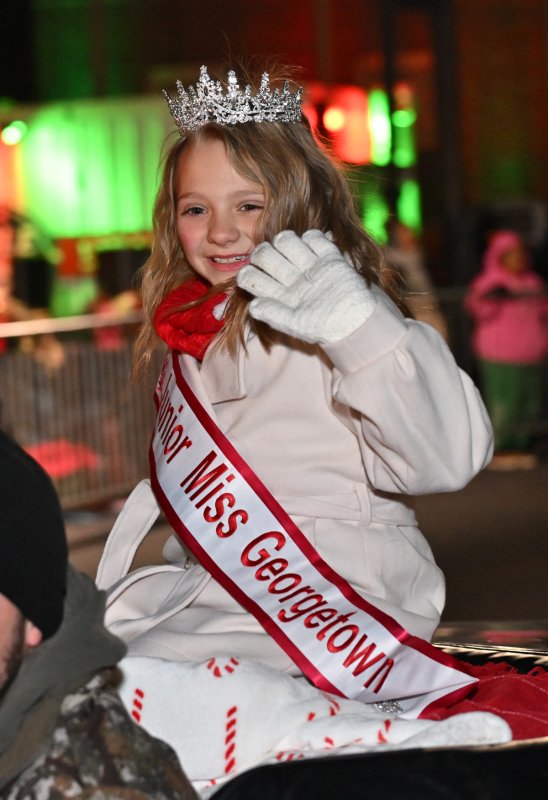 Junior Miss Georgetown Presley Jones waves to her fans.