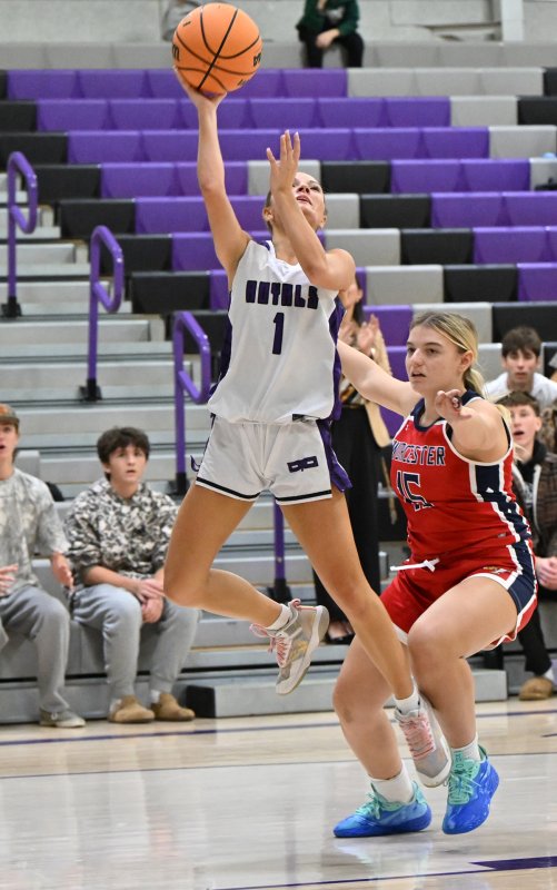 Royals senior Riley Barto goes strong to the hoop.