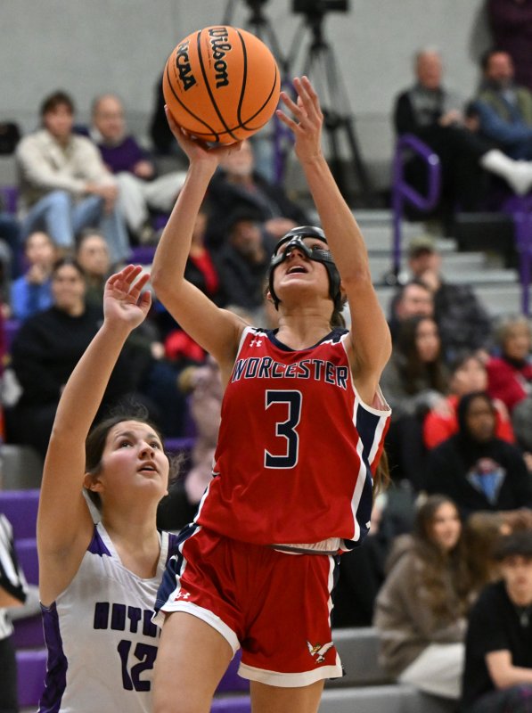 Senior Ayla Yonker hits a shot for the Mallards.