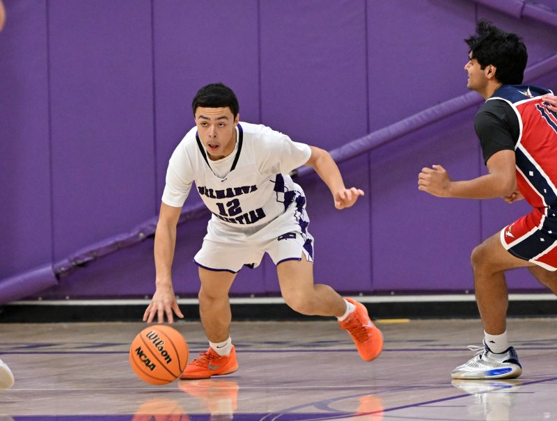 Royals freshman point guard Aarian Tucker starts a Delmarva Christian fast break.