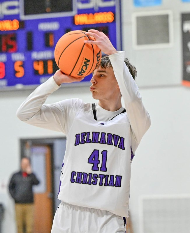 Royals sophomore Asher Woods lines up and knocks down one of his five three-pointers in the game.