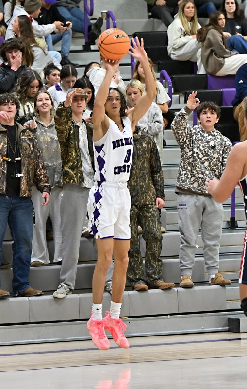 Royals senior Seth Mifflin shoots a three.