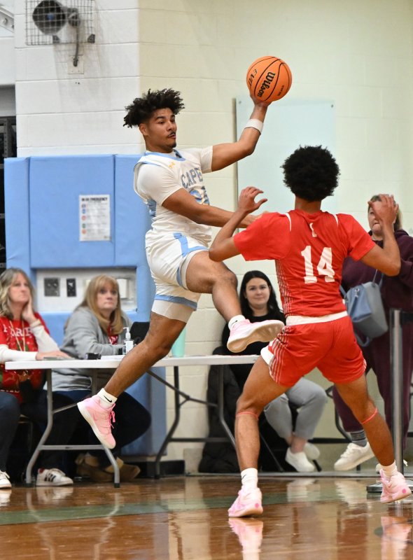 Cape senior Dell Richards saves the ball along the end line.