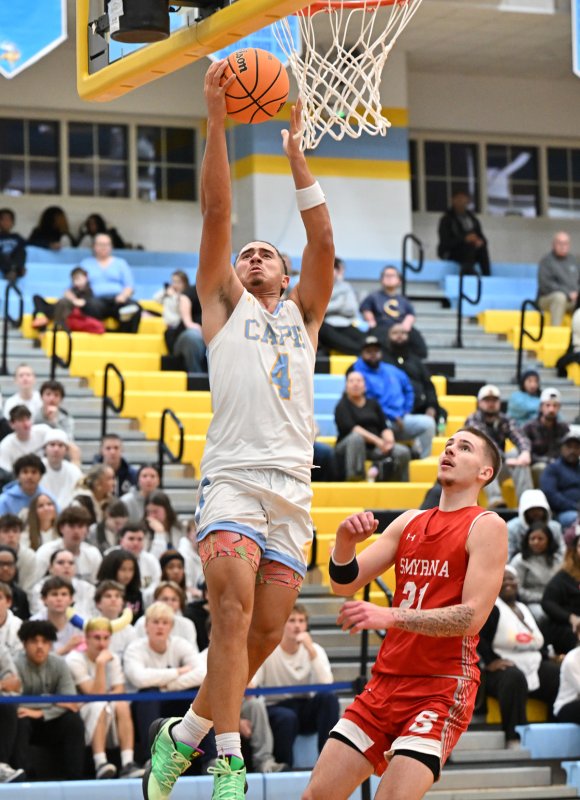 Cape’s Jameson Tingle goes in strong for two of his 20 points.