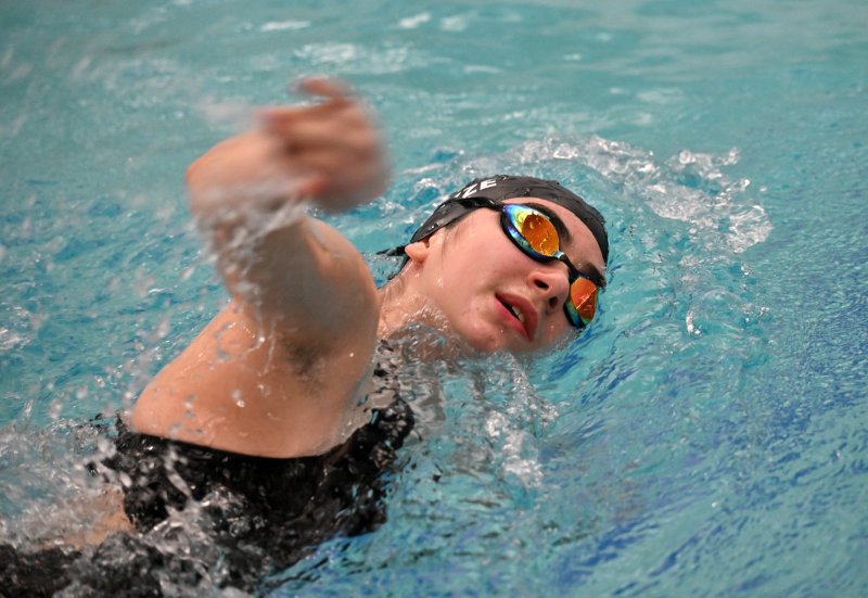 Senior Gianna Razze powers in the freestyle.