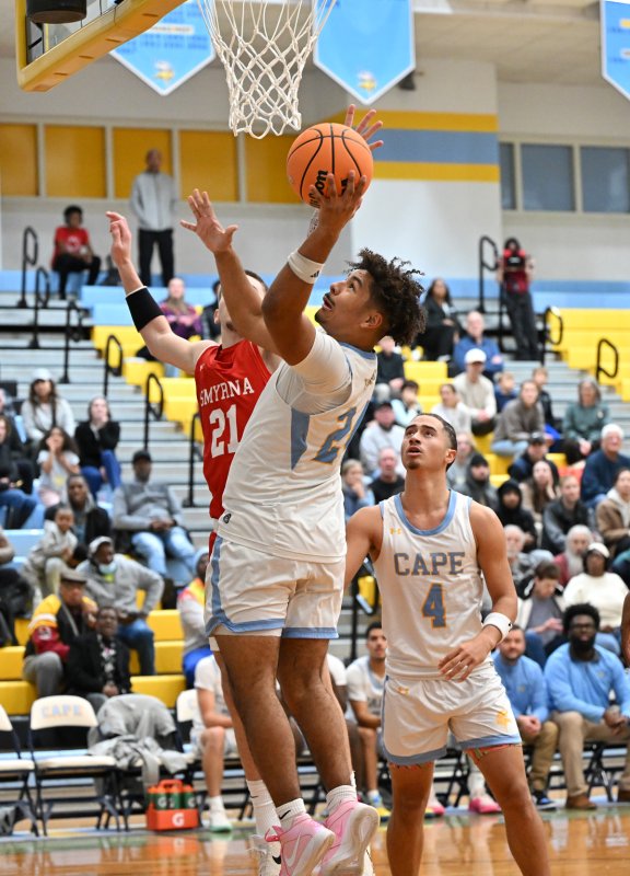 Cape senior Dell Richards goes to the hoop.