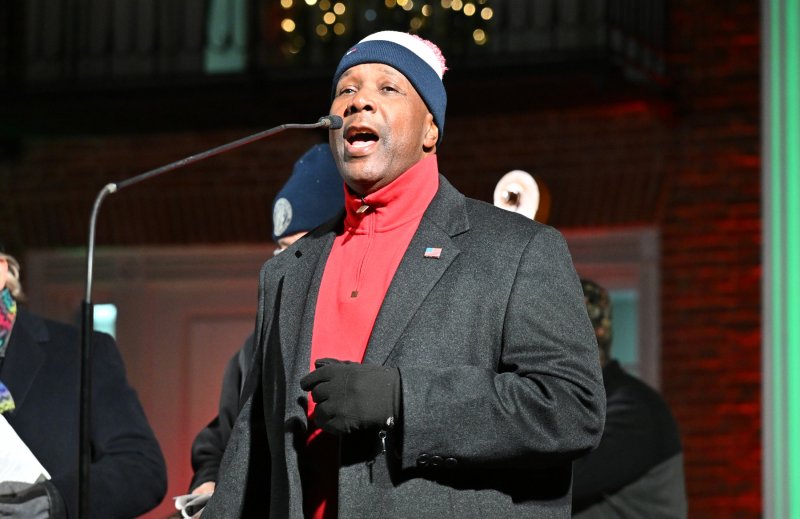 Greg Fuller, Sussex County’s register of wills, lends his singing talent to the caroling group.