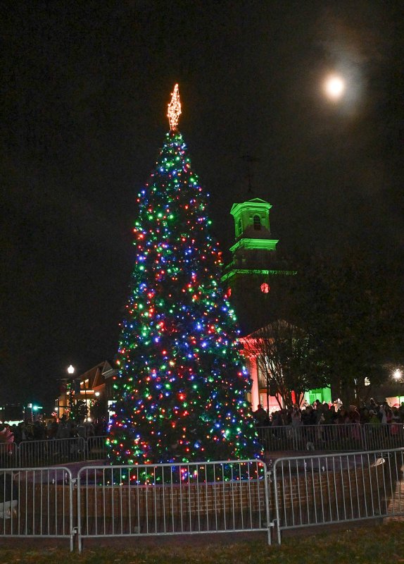 The Christmas tree is lit before the parade.